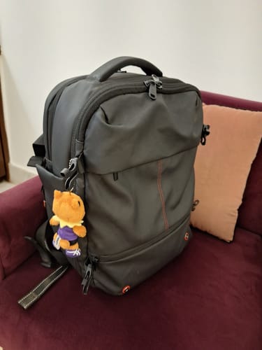 Traveller using an AerCabin backpack
