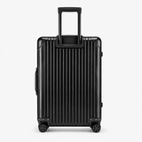 Black suitcase with a visible brand logo on a white background