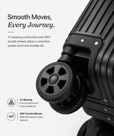 Close-up of a black hard-shell suitcase wheel with marketing text on a light gray background, highlighting tri-bear construction and 360° double wheels.
