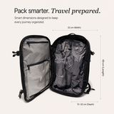 An open black backpack shown on a light beige background with text and dimension lines indicating width 32 cm, length 49 cm, and depth 15-20 cm.