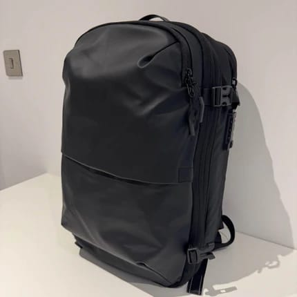 Traveller using an AerCabin backpack