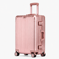 A metallic rose gold aluminum spinner suitcase with a telescoping handle extended, shown on a clean white background.
